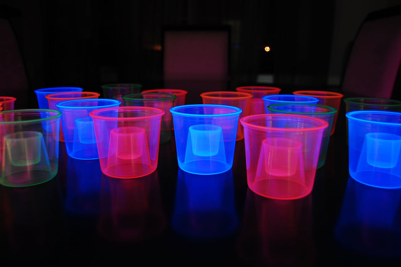 4 Ounce 20ct UV Blacklight Reactive Soft Plastic Bomber Glow Party Shot Glass Cups