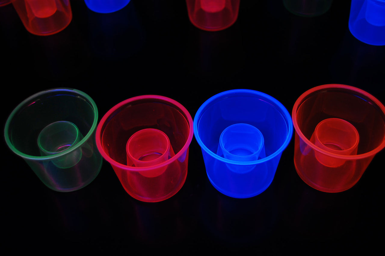 4 Ounce 20ct UV Blacklight Reactive Soft Plastic Bomber Glow Party Shot Glass Cups