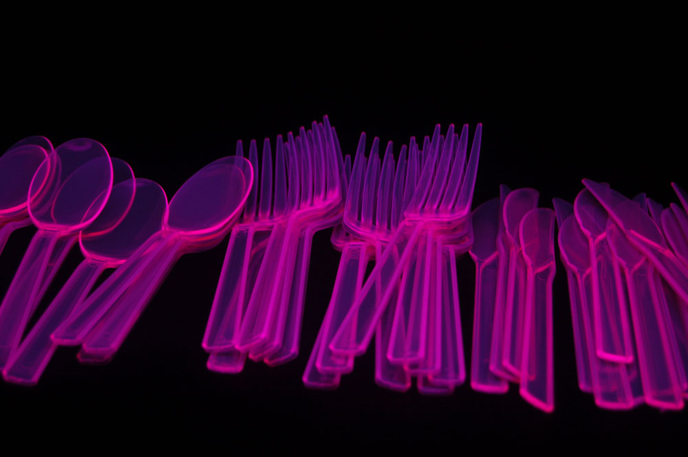 Pink UV Blacklight Reactive Cutlery Set- 51 Count